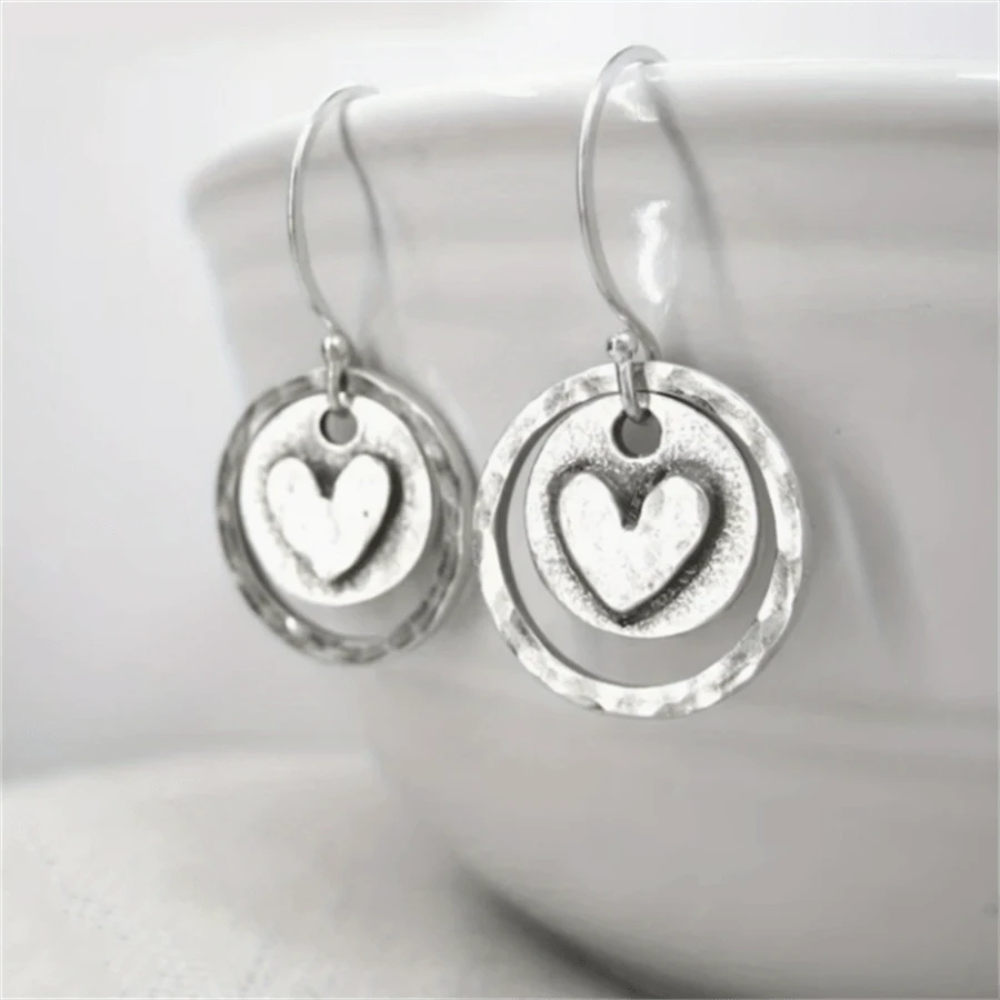 Hollow Heart Earrings - Silver
